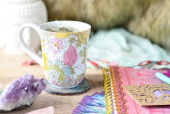 Tea cup with journal